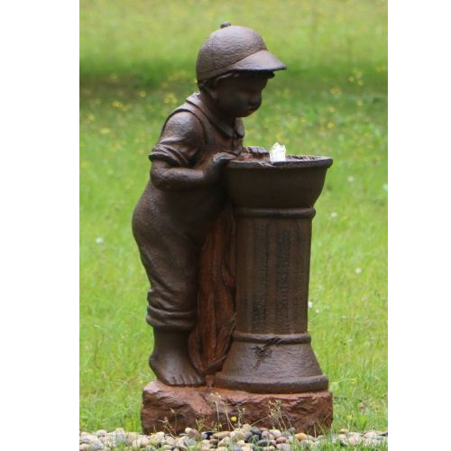 Boy at Water Fountain in garden setting