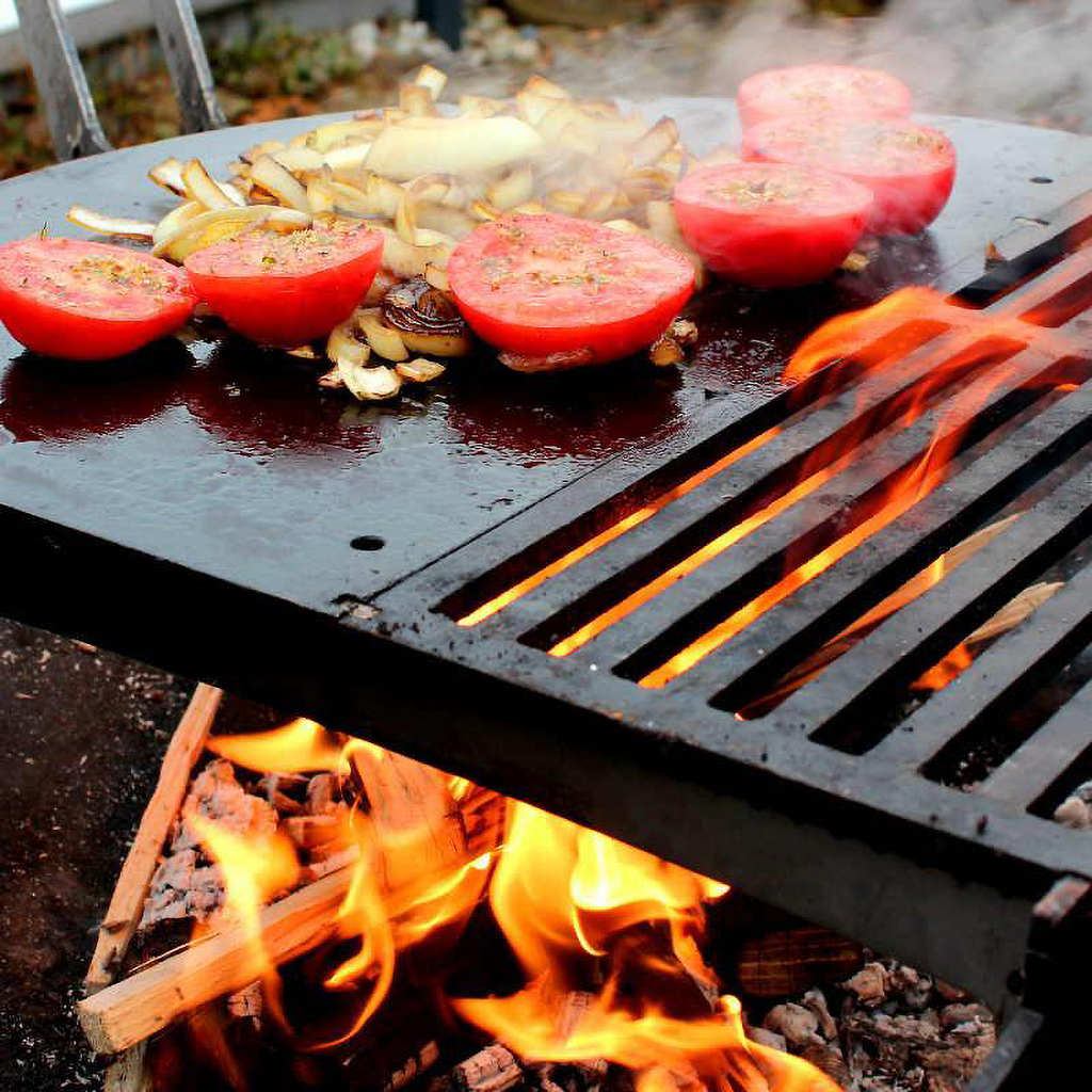 Yagoona Barramundi wood BBQ cooking tomatoes and onions