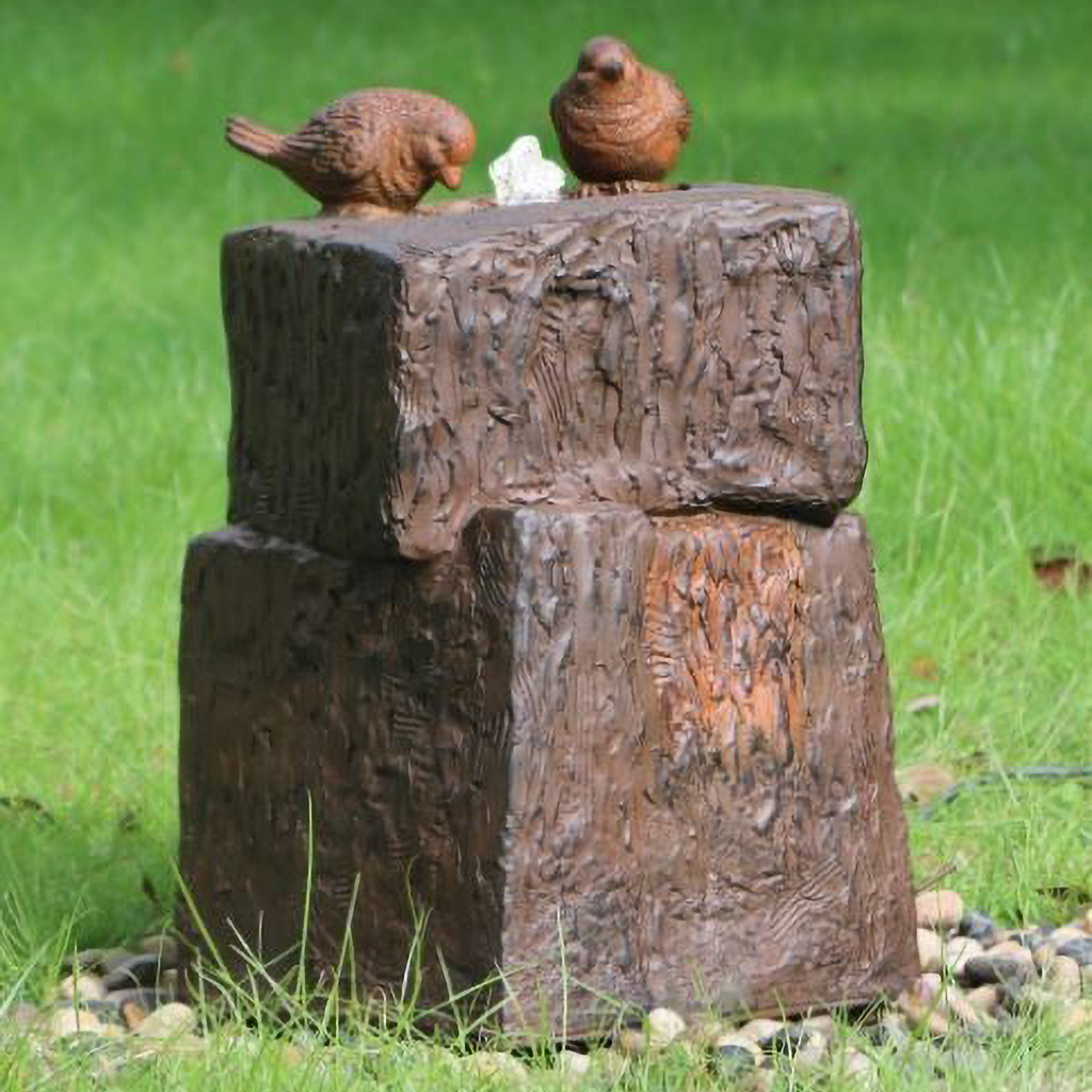 Two Dicky Birds sitting in a rock pool Water Fountain with Light 