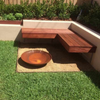 Cauldron 80cm Fire Pit in a garden setting