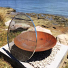 The Cauldron Cast Iron Fire Pit with stainless steel BBQ grill