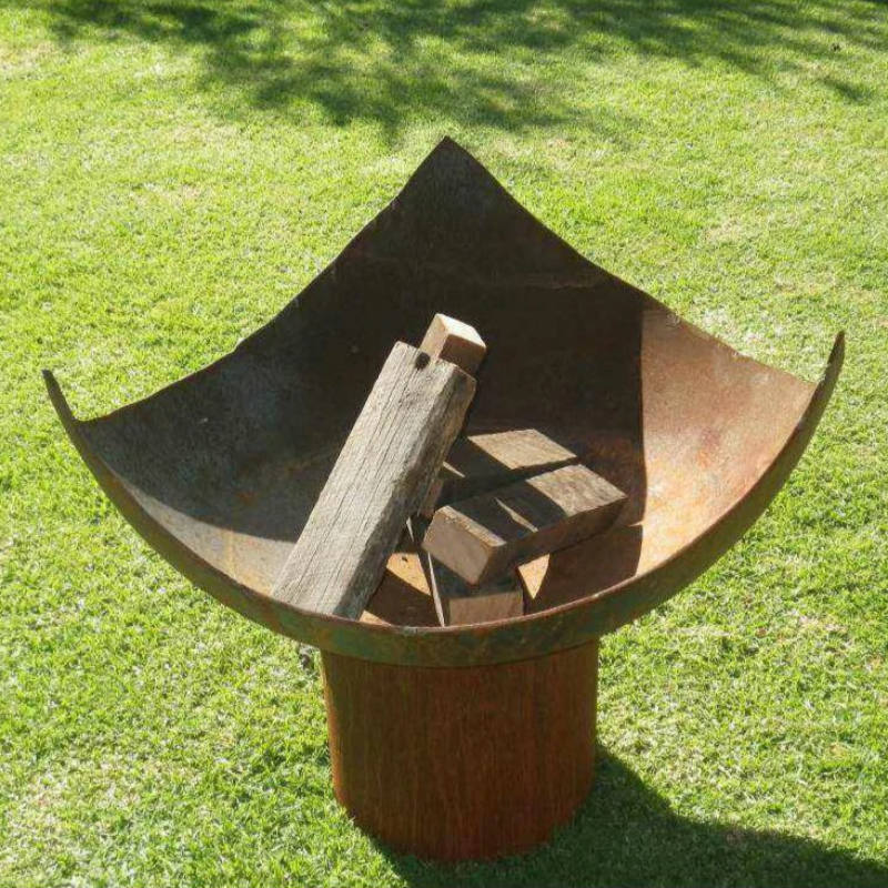 The Chalice Fire Pit with wood stacked - 80cm Diameter x 40cm Deep