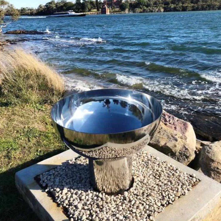 The Goblet Stainless Steel Fire Pit on the 300mm stand at the seaside