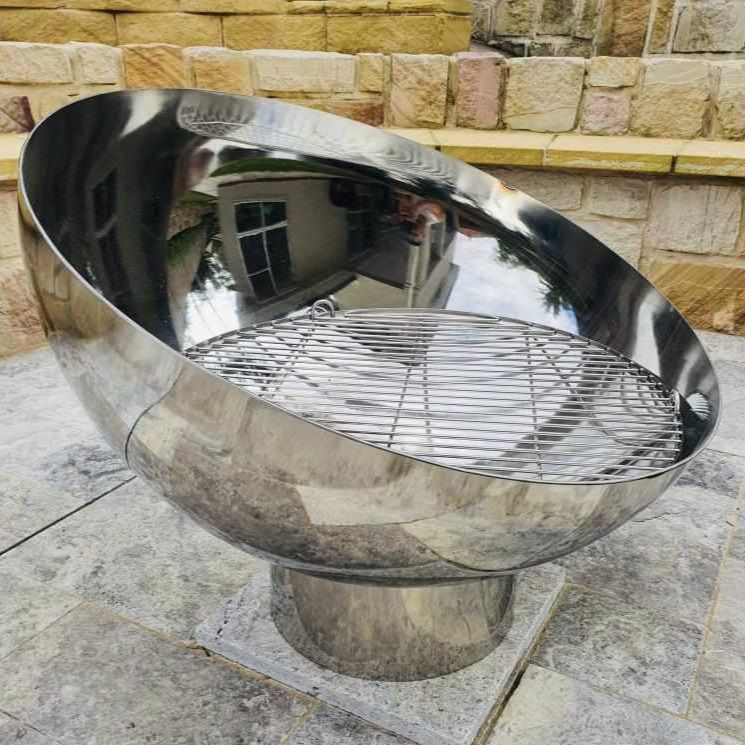 The Goblet Stainless Steel Fire Pit on the 150mm stand with a stainless steel grill