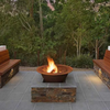 The Teppanyaki Fire Pit with a fire burning