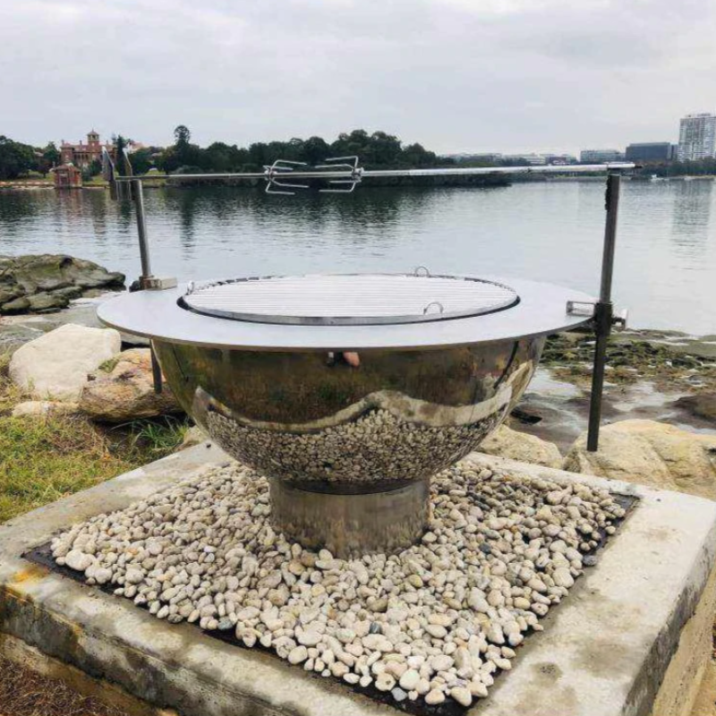 Teppanyaki Stainless Steel Fire Pit complete with BBQ grill, brackets, spit poles and rotisserrie