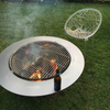 Teppanyaki Stainless Steel Fire Pit in backyard setting with fire burning