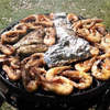 The Ultimate BBQ Fire Pit grilling prawns