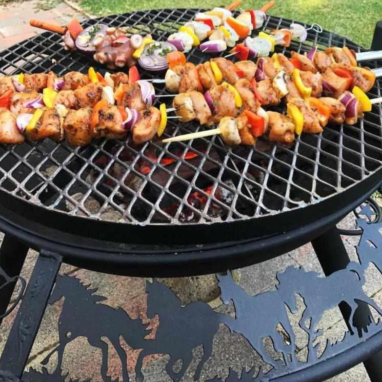 The Ultimate BBQ Fire Pit grilling kebab sticks