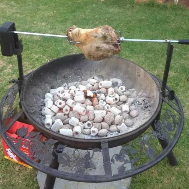 The Ultimate BBQ Fire Pit with a lamb roast cooking on spit